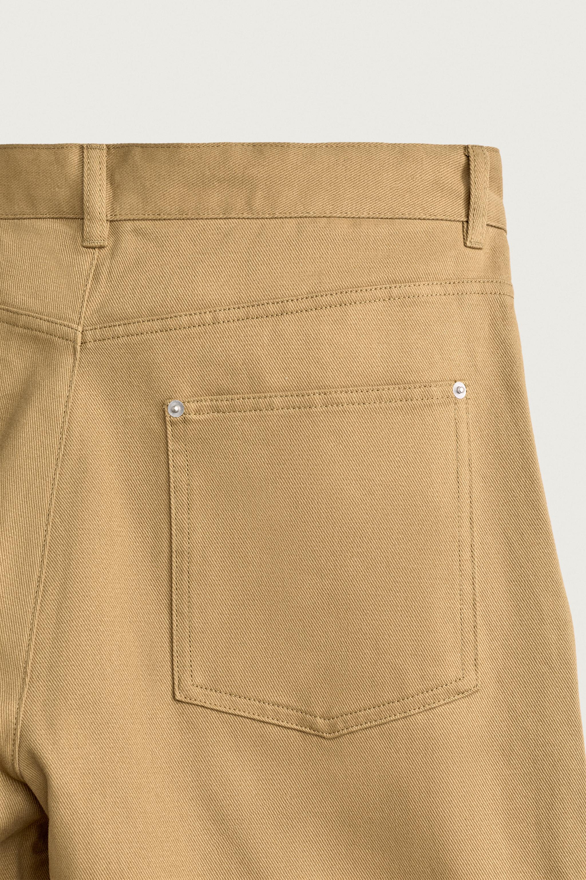 PANTALON À PLIS COUPE BARREL